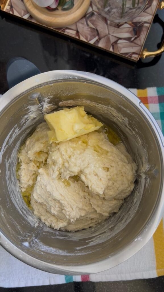 Butter and olive oil added to smooth banana roll dough
