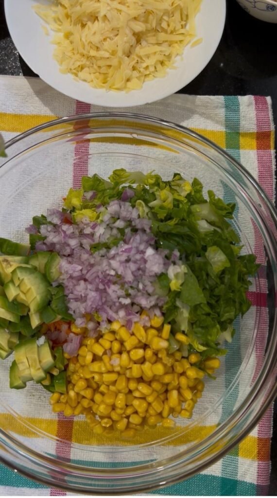 Sweet corn and diced red onion added to the tuna wrap filling