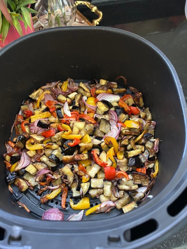 Air-fried eggplant, peppers and onion, tender and caramelized