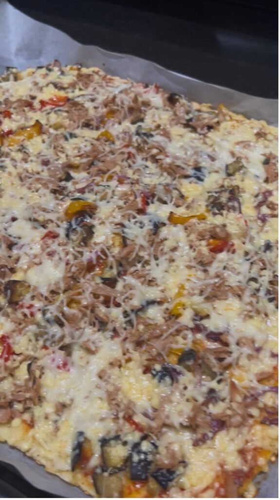 Baked high protein veggie pizza, golden and bubbling