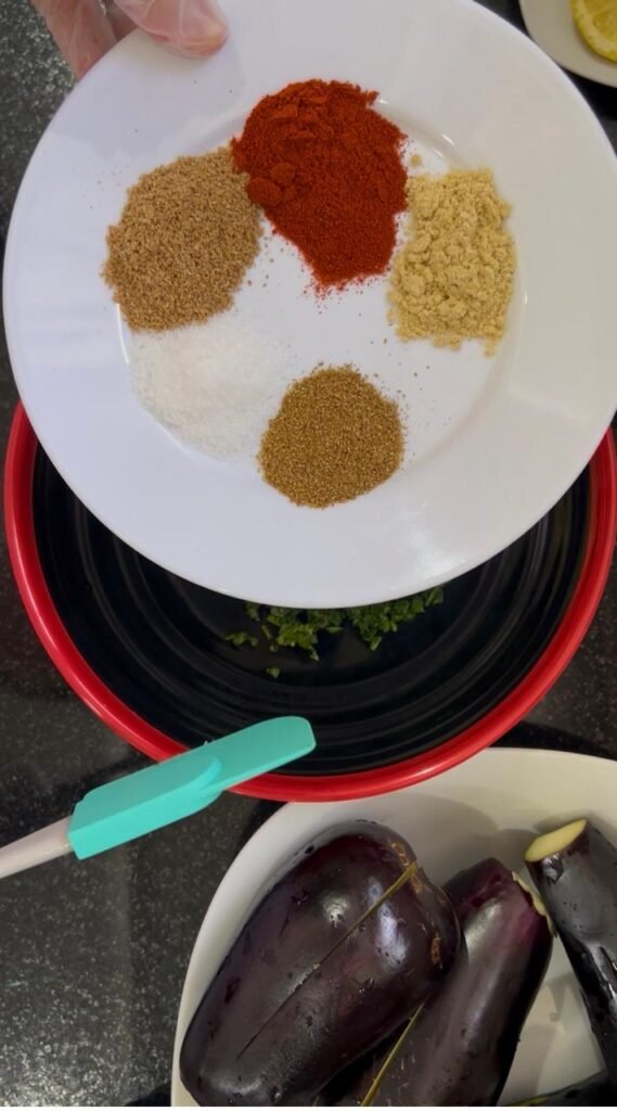 Spices measured on a white plate for the marinade