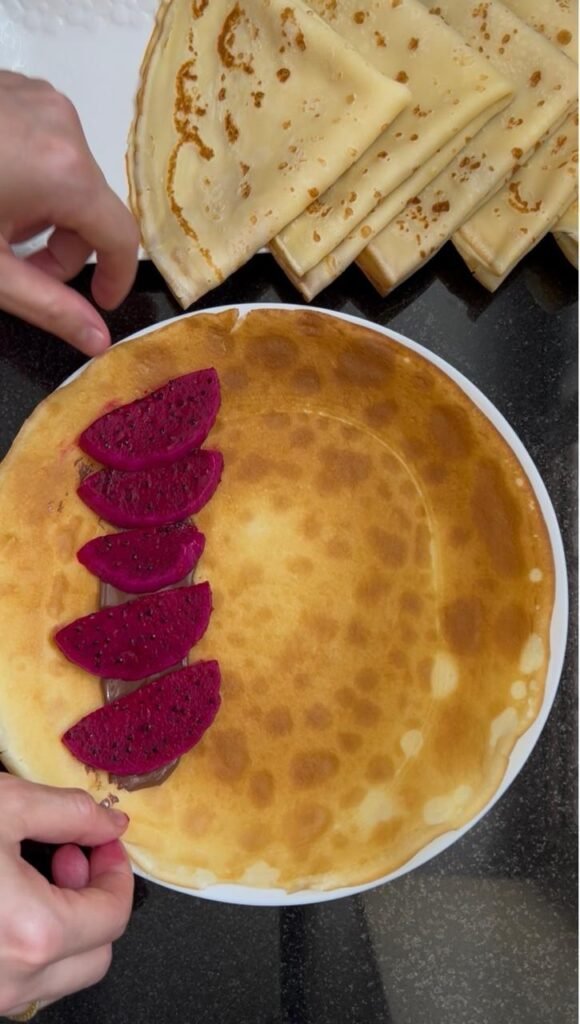 Buttermilk crepe filled with chocolate and pink dragon fruit slices