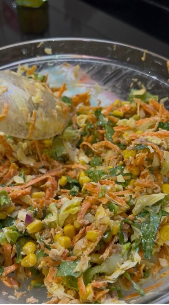 Mixed tuna wrap filling with carrot, corn, lettuce and avocado