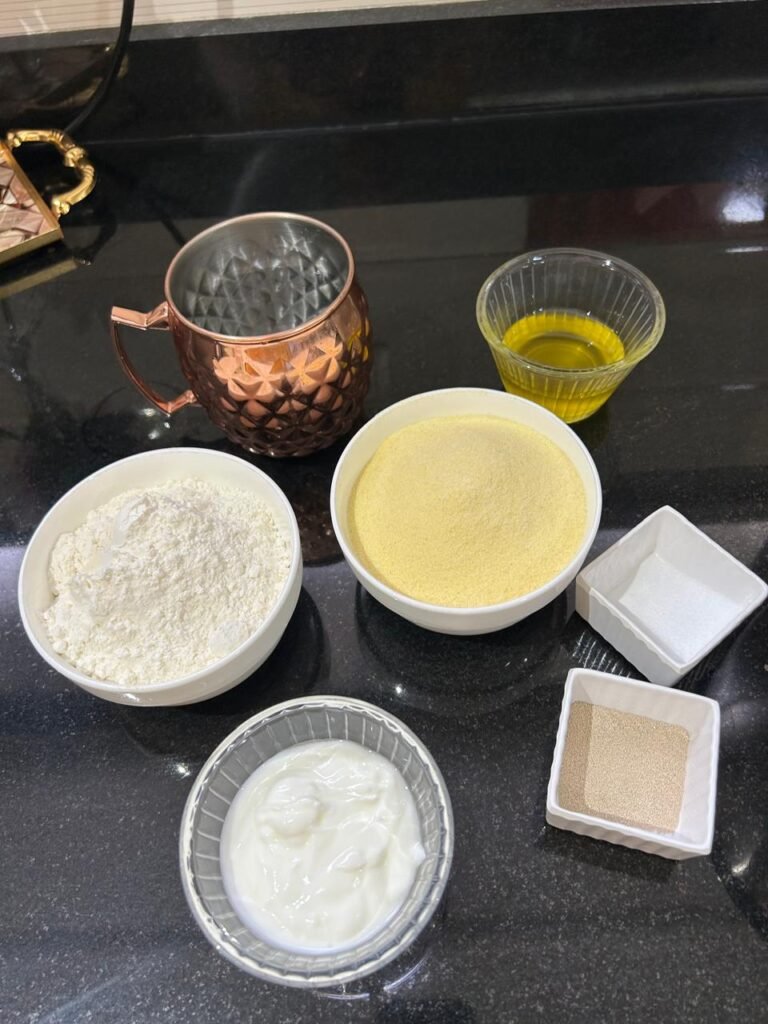Ingredients for pizza dough: flour, semolina, yogurt, olive oil and yeast