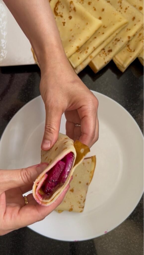 Rolled buttermilk crepe filled with dragon fruit