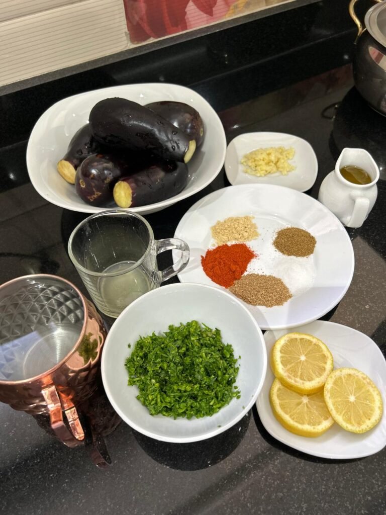 Ingredients for chermoula stuffed eggplant laid out on a counter