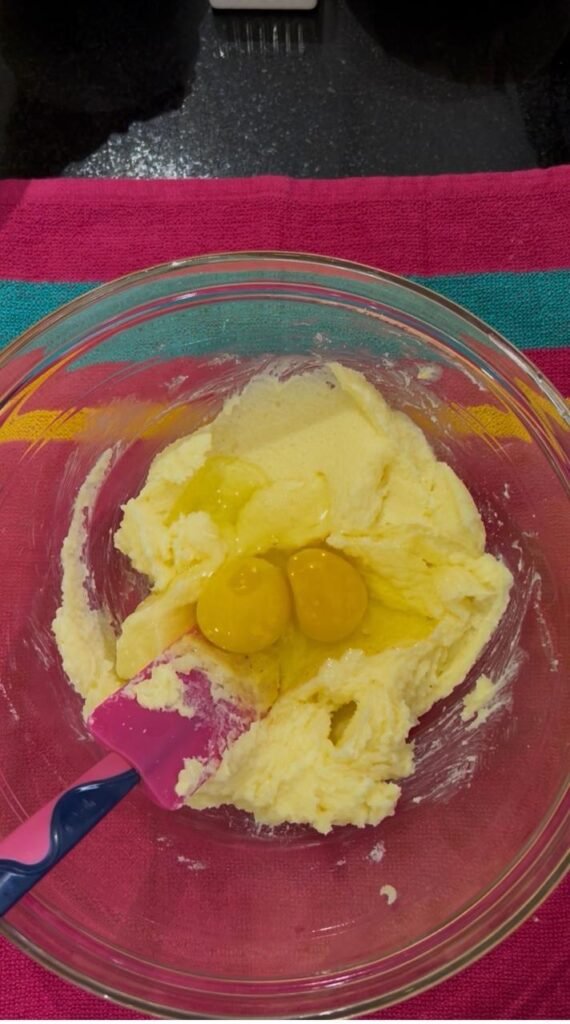 Eggs added to creamed butter and sugar