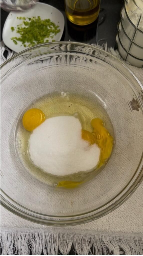 Eggs whisked with sugar for easy orange basbousa cake batter