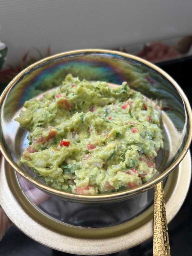 Finished easy homemade guacamole ready to serve with tortilla chips