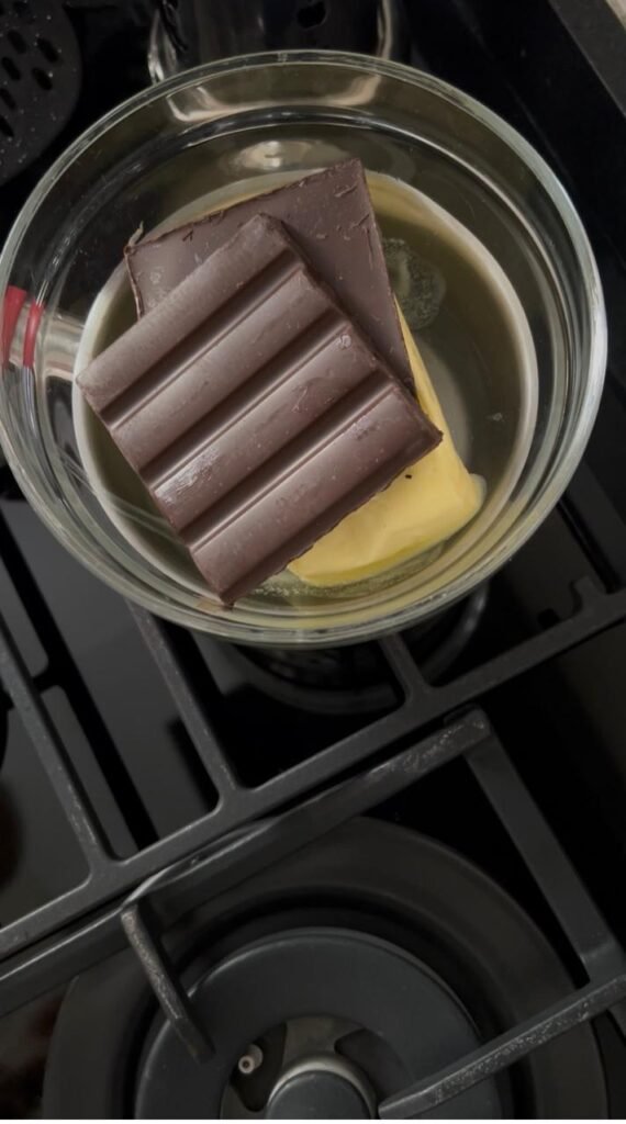 Dark chocolate and butter melting in a double boiler