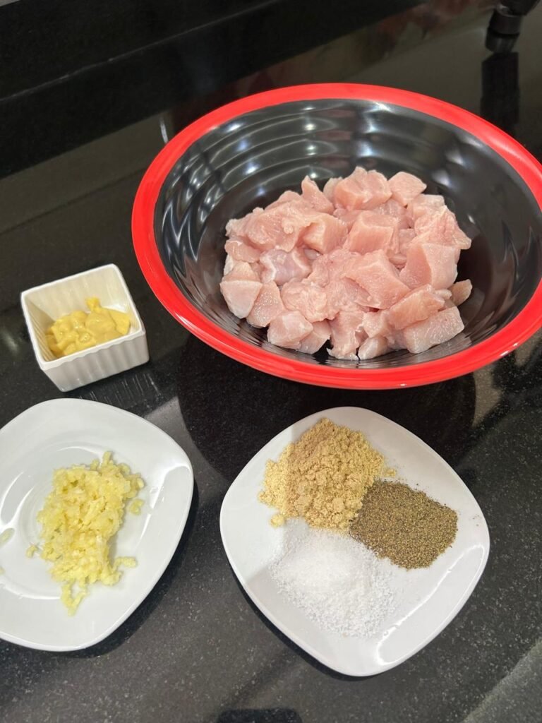Diced chicken breast marinated with ginger, mustard, garlic, black pepper, salt, and olive oil for easy creamy chicken penne