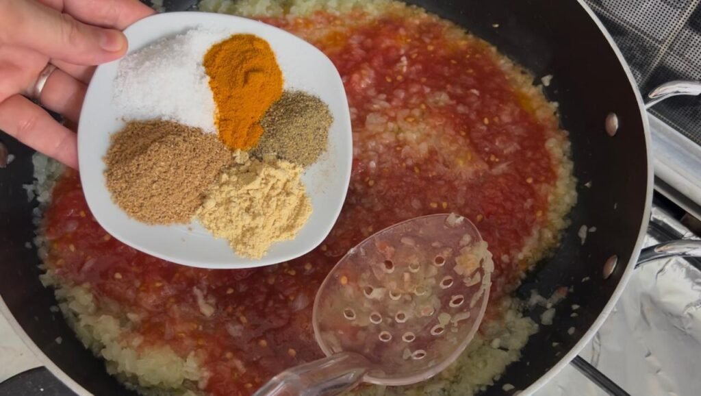 Spice mix for easy meatball and potato stew showing turmeric, ginger, coriander